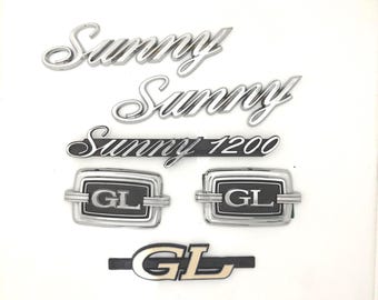 Juego de emblemas y emblemas para Nissan Sunny 1200 GL: Reemplazo de plástico ABS hecho a mano