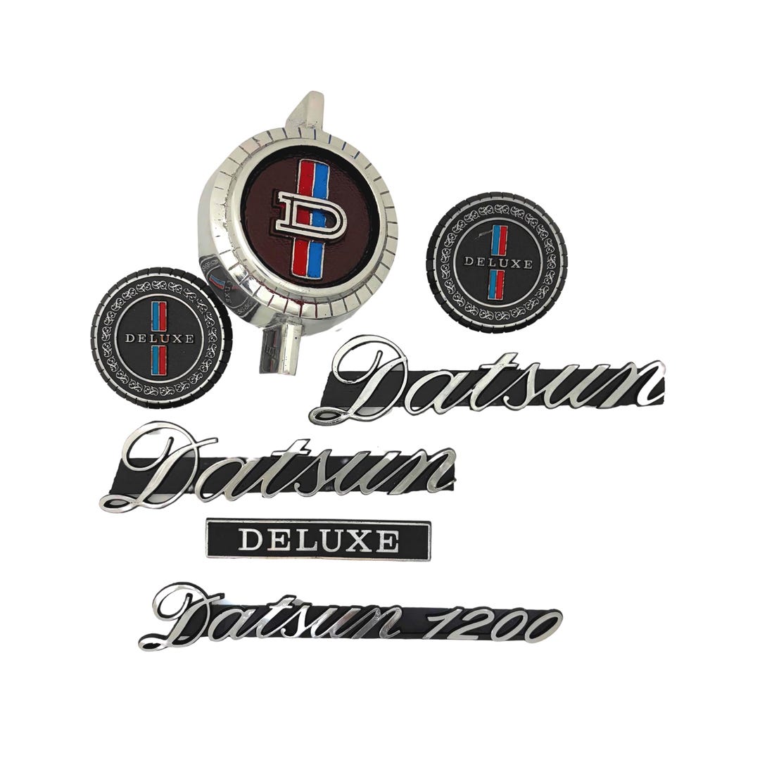 4個　ダットサン５１０フェンダーエンブレム（ワゴン）1968-1971 他モデル il_1080xN.6800894912_8a0s.jpg