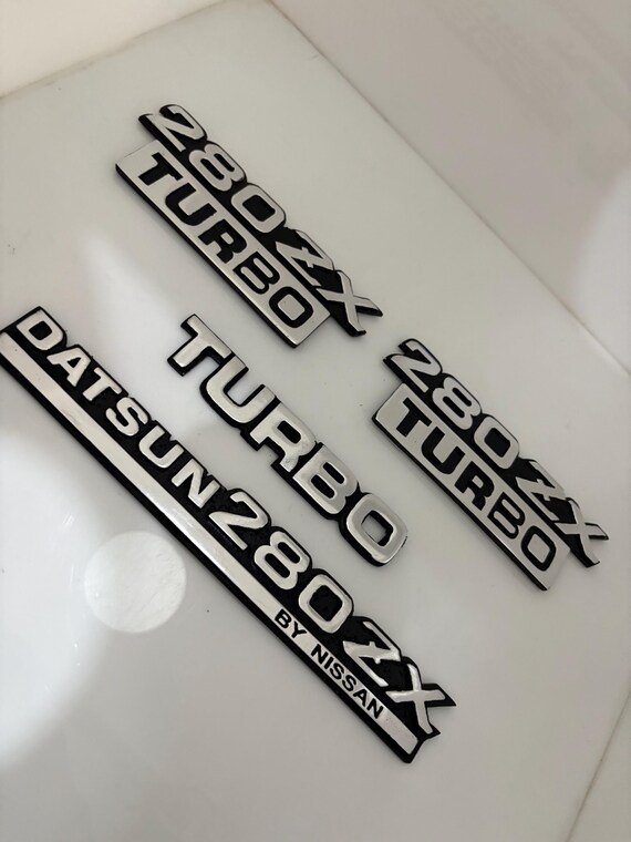 Datsun 280ZX by Nissan Turbo Rear Trunk and Fender Badge