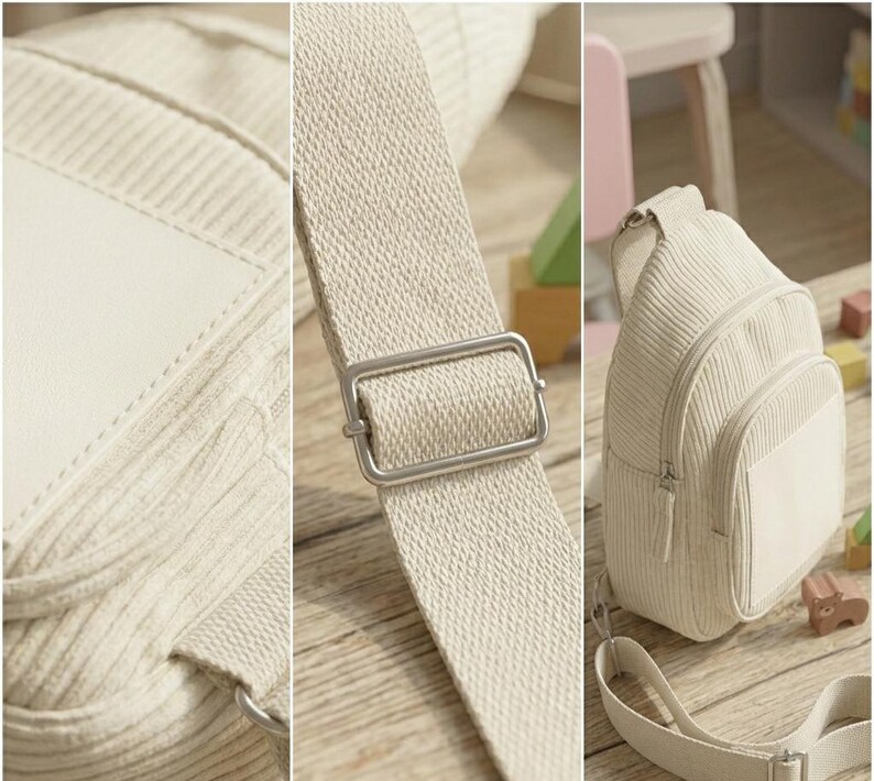 Puede incluir: Bolso bandolera de pana color crema con un bolsillo frontal y una correa ajustable. El bolso tiene una hebilla de metal plateado y un parche blanco en blanco. El bolso est&aacute; sobre una superficie de madera.