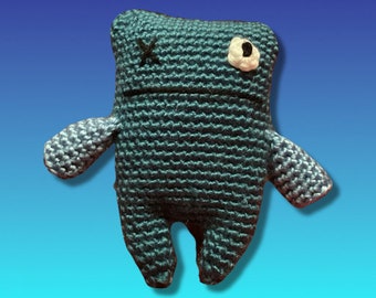 Crocheted little blue odd doll