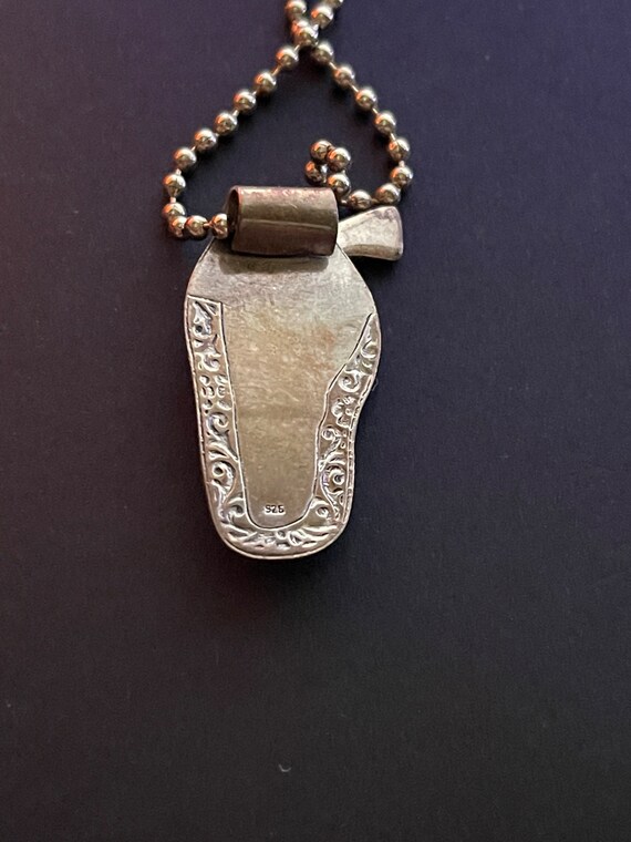 Sterling silver vintage gun and holster charm Gem