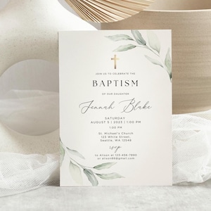 May include: A white baptism invitation with a gold cross and green watercolour leaves. The text reads "Join us to celebrate the Baptism of our daughter Jennah Blake, Saturday August 5, 2023 11:00 PM 1:00 PM St. Michael's Church 123 White Street Seattle, WA 12548 RSVP to Alison at 123-456-7890 89@gmail.com"