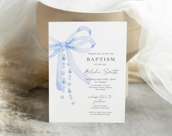 May include: A white baptism invitation with a light blue watercolor bow and pearl accents. The invitation includes the text "Please join us for the BAPTISM of our son" and event details. The invitation is 5 inches wide and 7 inches tall.