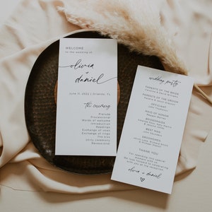 May include: Wedding ceremony program cards with white background and black text. The cards list the order of the ceremony and the wedding party. The text includes the names Olivia and Daniel.