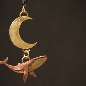 Whale flying under the moon pendant, completely handmade in brass and copper. Cetacean pendant on commission.