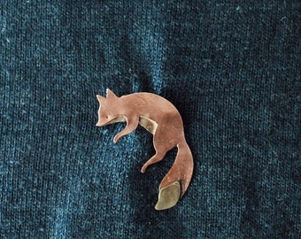 Playing fox brooch, made of copper and brass, on commission.