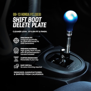 May include: A black shift boot delete plate for a 2009-2013 Honda Fit GE8, featuring a blue spherical shift knob on a silver metal shaft. The text reads 09-13 HONDA FIT (GE8) SHIFT BOOT DELETE PLATE, CLEANER LOOK. STYLISH FIT & FINISH.