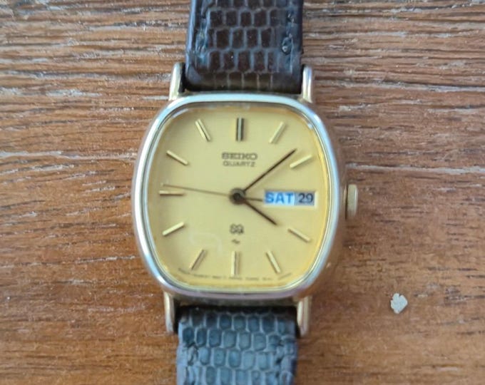 Seiko SQ Quartz Watch Womens Small Brown Gold Tone Day Date Vintage Classic