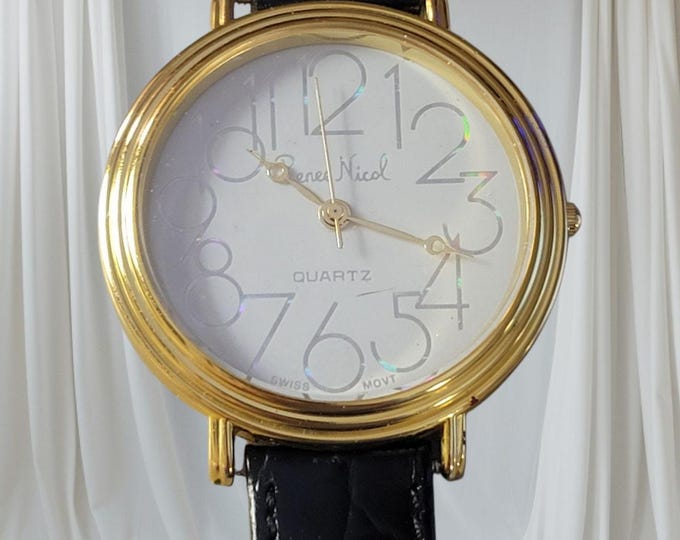 Renee Nicol Women's Gold Tone Watch: Sparkle Face, Easy Read