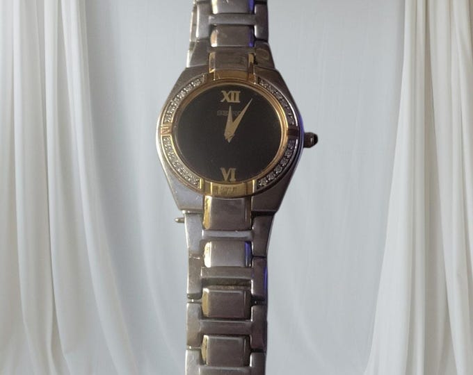 Seiko Ladies Seiko Dress Watch Black Dial Stones around Bezel Elegant Classy