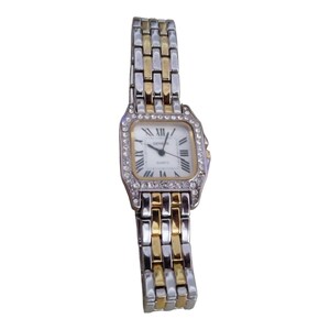 May include: A silver and gold-toned quartz watch with a rectangular face. The watch face is white with black Roman numerals and gold-toned hands. The bezel is encrusted with small, clear crystals. The watch band alternates silver and gold-toned links.