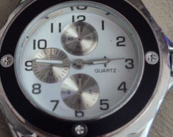 Sport Watch Unisex Silver bezel black trim Watch face good for men or ladies