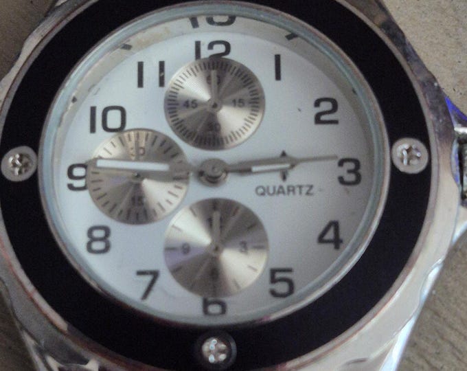 Sport Watch Unisex Silver bezel black trim Watch face good for men or ladies
