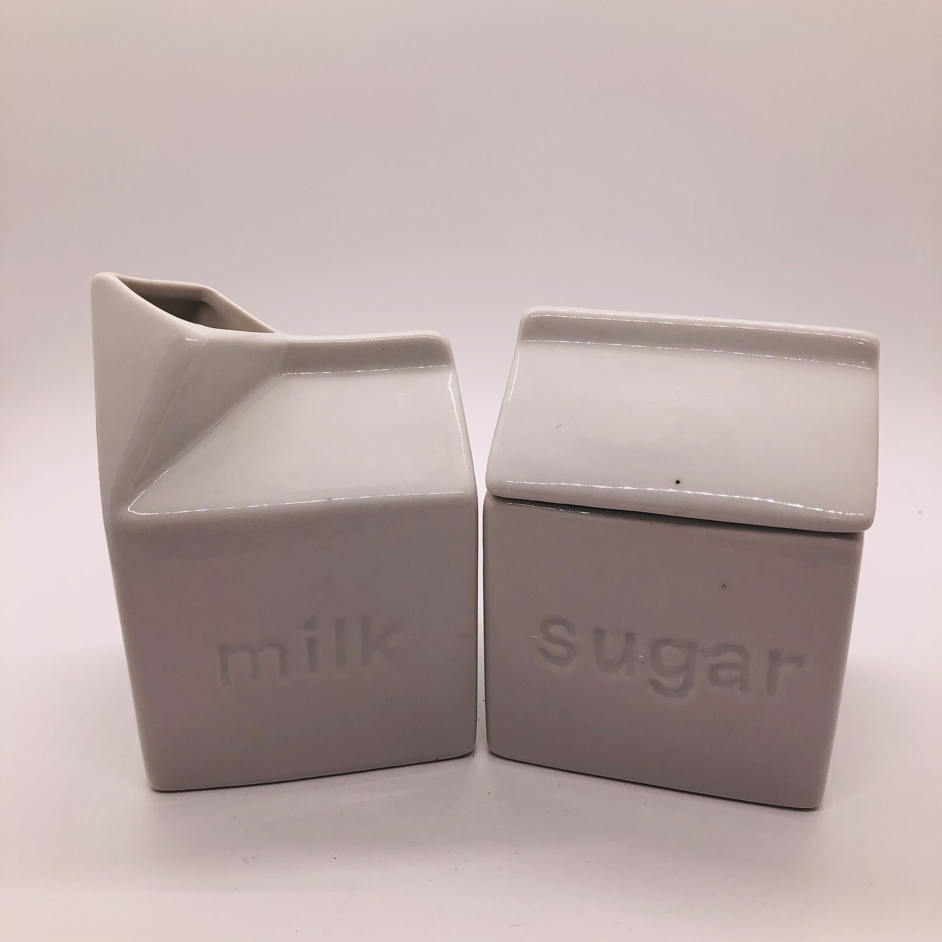 Pair of BIA, Cordon Bleu porcelain Milk carton shaped milk & sugar