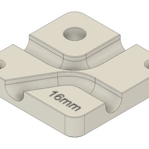 May include: A white plastic 3D printed mold with a 16mm inscription and four holes. The mold is designed to create a rounded shape.