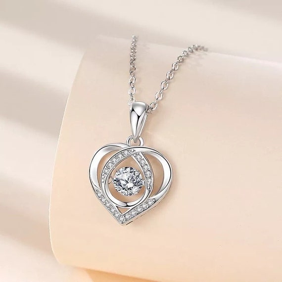 Beating heart shop diamond necklace