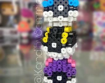 May include: A stack of three colorful pixel art pokeballs. The top pokeball is blue with white and black details. The middle pokeball is yellow with black and white details. The bottom pokeball is purple with black and white details.