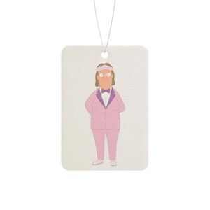 May include: Rectangular air freshener featuring a cartoon character in a pink suit, bow tie, and headband. The character is standing with their hands behind their back. A white string is attached at the top for hanging.