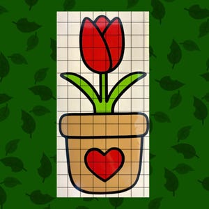 May include: A red tulip with green leaves in a brown pot with a red heart on the front.