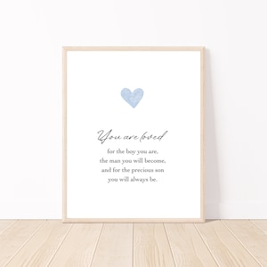 May include: A light blue watercolor heart with a white background and the text "You are loved for the boy you are, the man you will become, and for the precious son you will always be."