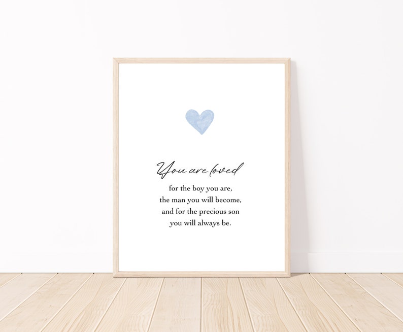 May include: A light blue watercolor heart with a white background and the text "You are loved for the boy you are, the man you will become, and for the precious son you will always be."