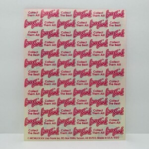 May include: A sheet of pink and white stickers with the text "Lisa Frank" and "Collect Them All!" repeated multiple times. The stickers are designed with a pink and white swirl pattern.