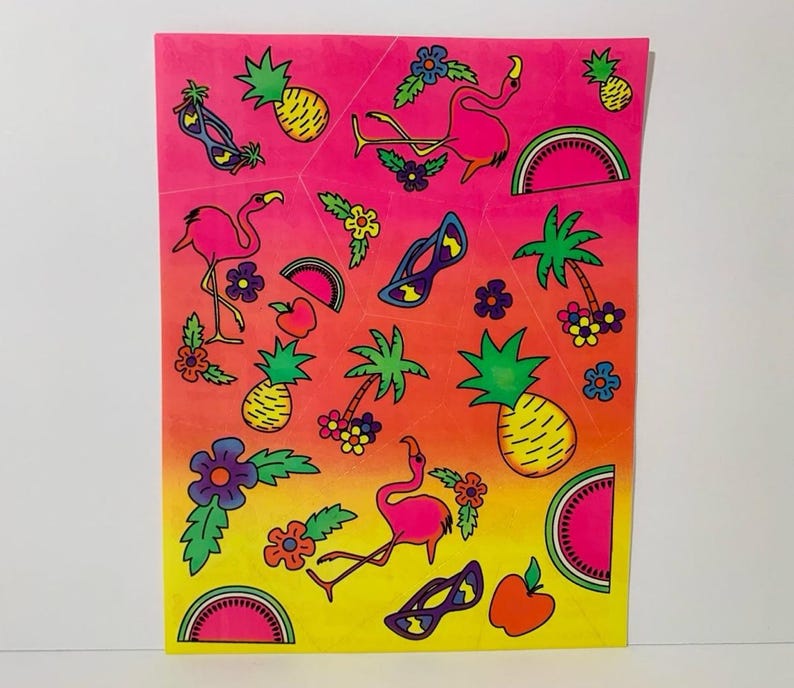 May include: A sheet of colorful stickers with a tropical theme. The stickers feature pink flamingos, palm trees, pineapples, watermelons, sunglasses, and flowers. The stickers are on a gradient background that transitions from pink to yellow.