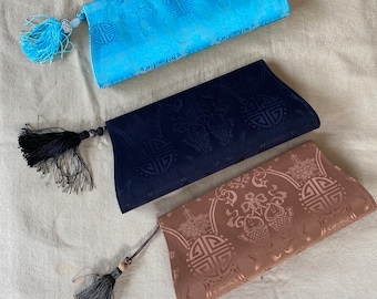 Braune Brokat-Clutch