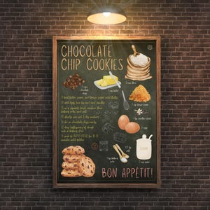 May include: A chalkboard-style sign with a wooden frame displays a chocolate chip cookie recipe. Ingredients like butter, sugar, and chocolate chips are illustrated. The words "Chocolate Chip Cookies" and "Bon Appétit!" are written on the sign.