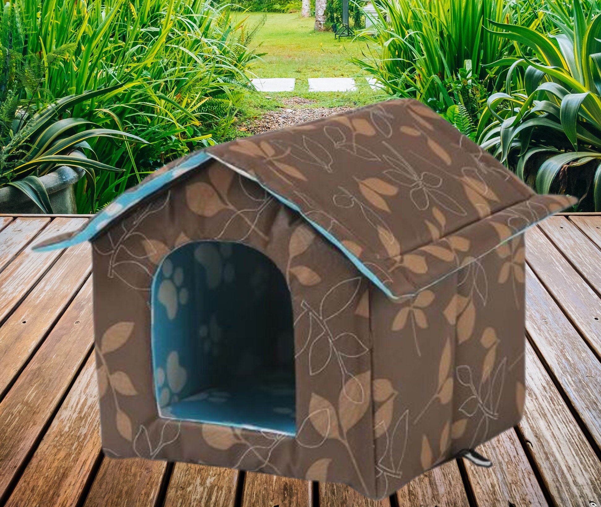 Insulated feral cat shelter with reflective mylar insulation, door flap,  and a built in awning. 