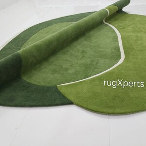 modern designer green color odd shape area rug for living room , bedroom , contemporary hand tufted wool rug