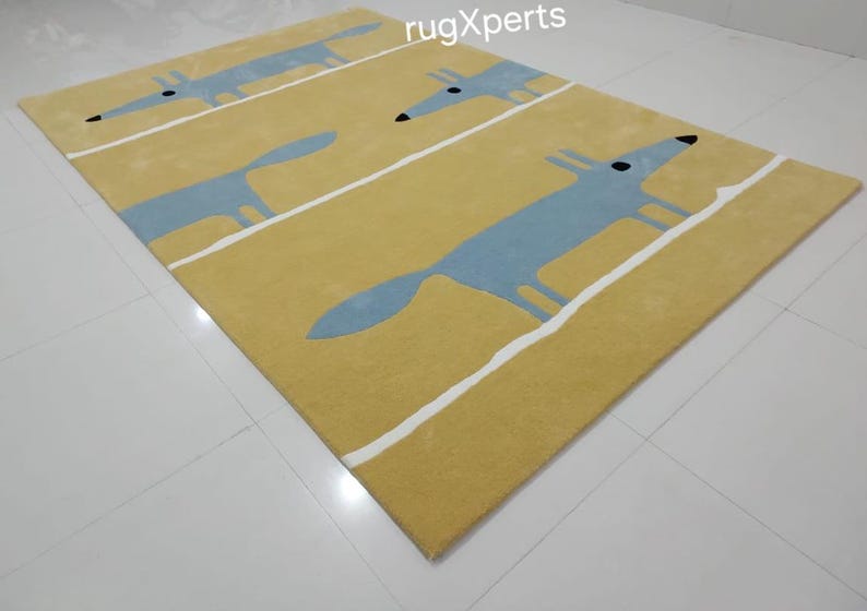 May include: A yellow rug with a repeating pattern of blue foxes. The foxes are outlined in white and have black eyes. The rug has a white border.