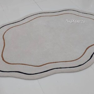 modern abstract odd shape area rug for living room , bedroom , contemporary designer hand tufted wool rug