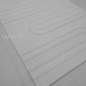 handmade tufted solid color embossed area rug for living room , bedroom , contemporary designer wool rug