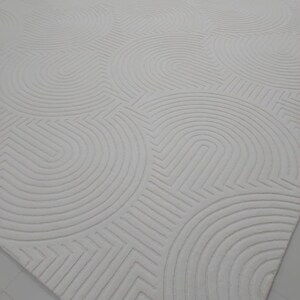 Premium quality ivory embossed area rug for living room , bedroom , contemporary designer wool rug can be customize in any color size shape