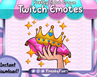 May include: A pink pillow with gold trim and a gold crown with blue hearts on top. The pillow is being held by a hand with pink nail polish. The background is pink with a glittery texture and the text "Pretty Lil Dub Crown Twitch Emotes" at the top.