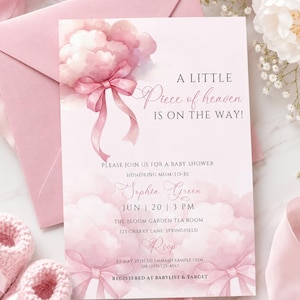 May include: Pink baby shower invitation with the text "A Little Piece of Heaven Is On The Way!". The invitation features a watercolor cloud design and a pink bow. Includes details for Sophia Green's baby shower.