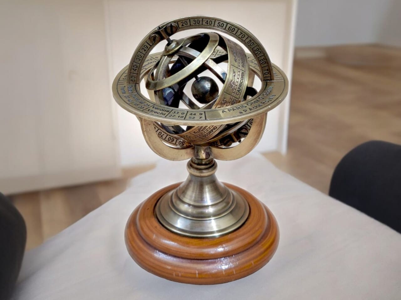 Vintage Brass Armillary Sphere on Elegant Wooden Base: A Nostalgic Décor Accent for Your Home Décor Antique - Inspired Armillary Sphere