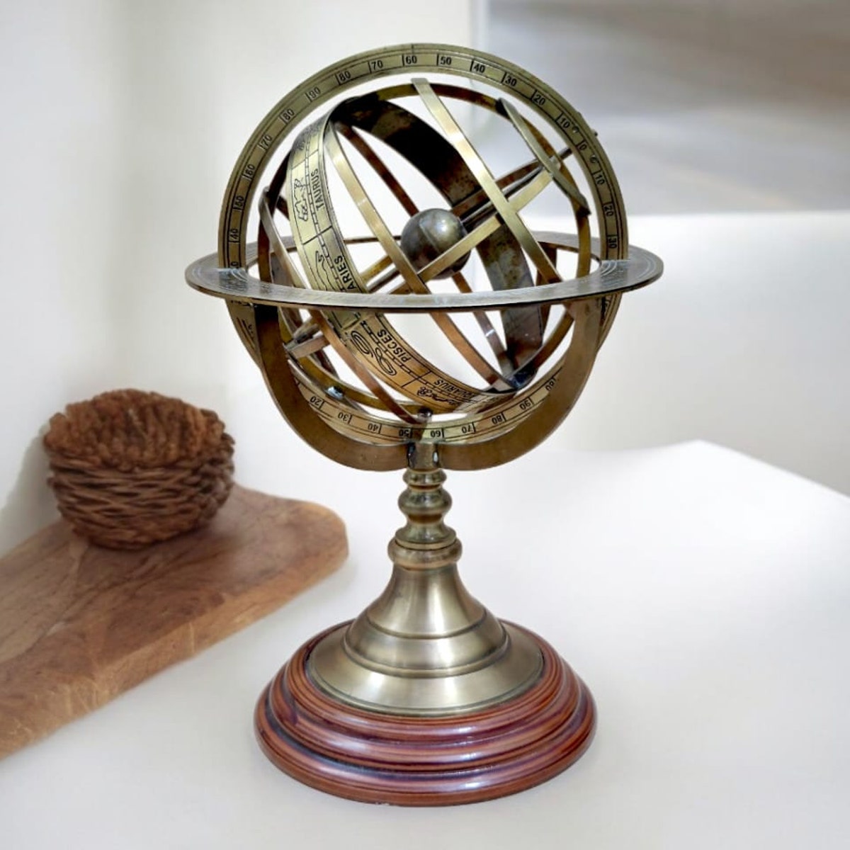 Vintage Brass Armillary Sphere on Elegant Wooden Base: A Nostalgic Décor Accent for Your Home Décor Antique - Inspired Armillary Sphere