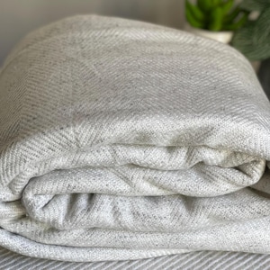 Ivory Grey Wool Sofa Blanket – Soft & Warm Handloomed Throw from Nepal | Herringbone Himalayan Shawl