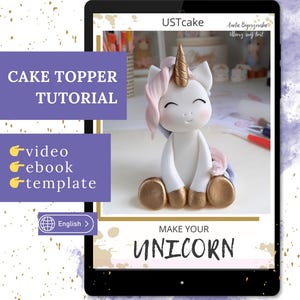 Peut inclure: Un cake topper licorne blanc avec une corne et des sabots dorés, une crinière et une queue roses, et un visage souriant. L'image est sur un écran de tablette avec le texte "CAKE TOPPER TUTORIAL" et "MAKE YOUR UNICORN".