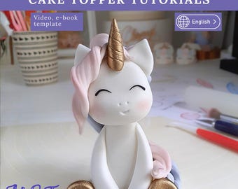ケーキトッパーの動画チュートリアル - 陽気なフォンダンユニコーン。女の子のレインボーバースデーパーティーにぴったりのパステルカラーのデコレーション。