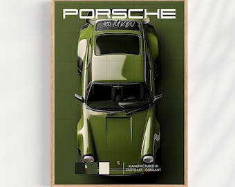 May include: A green Porsche 930 Turbo car with the text "930 Turbo" on the back window. The car is framed in a wooden frame with the word "PORSCHE" in white text at the top. The text "MANUFACTURED IN STUTTGART, GERMANY" is at the bottom of the image.