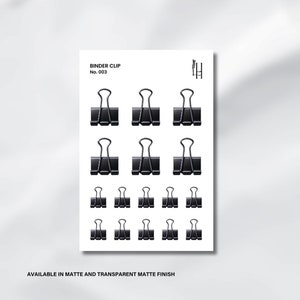 May include: A sheet of black binder clip stickers with the text "BINDER CLIP No. 003" and "AVAILABLE IN MATTE AND TRANSPARENT MATTE FINISH".