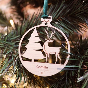 Personalized wooden “Reindeer” Christmas ball engraved with the first name to hang with the festive tree decorations