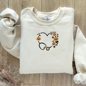 EMBROIDERED Halloween Nurse Sweatshirt, Nurse Costume, Halloween Sweater for Nurses, Fall Sweater, Gift for Nurses, Halloween Sweatshirt