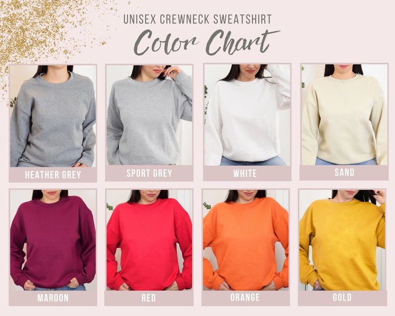 Puede incluir: Carta de colores que muestra varios colores de sudaderas con cuello redondo unisex. Los colores incluyen gris jaspeado, gris deportivo, blanco, arena, granate, rojo, naranja y dorado.