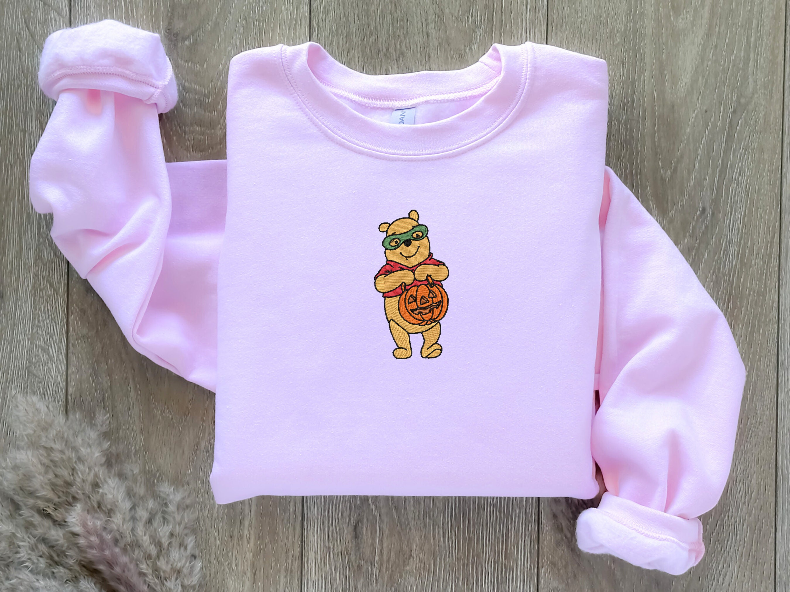 Discover EMBROIDERED Halloween Winnie the Pooh Sweatshirt, Fall Theme Crewneck, Custom Sweatshirt, Fall Sweater, Pumpkin Sweater, Super Hero Shirt