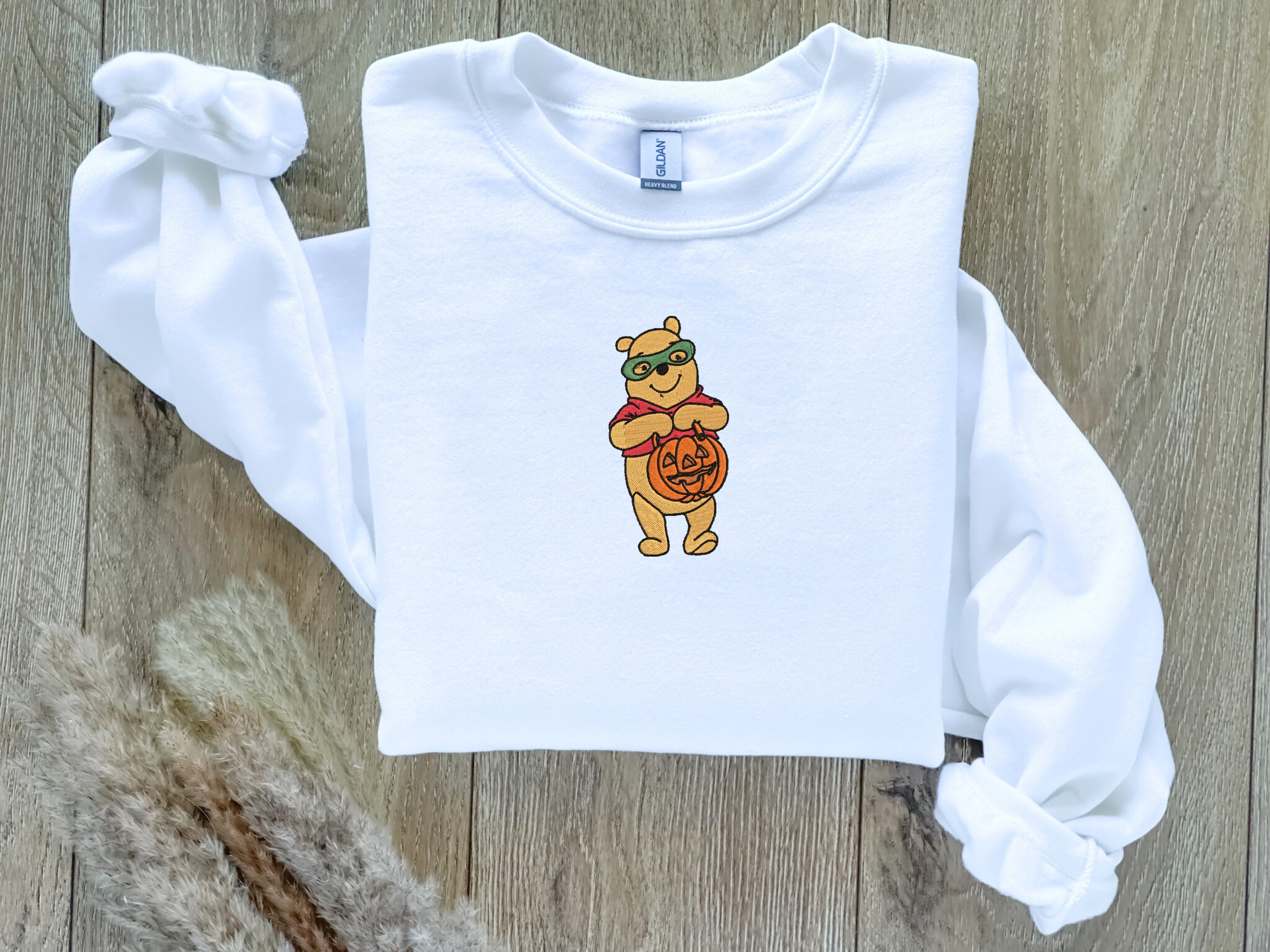 Discover EMBROIDERED Halloween Winnie the Pooh Sweatshirt, Fall Theme Crewneck, Custom Sweatshirt, Fall Sweater, Pumpkin Sweater, Super Hero Shirt